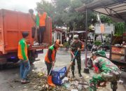 Koramil 06/Cempaka Putih Gadeng Kecamatan Cegah Banjir Dengan Bersihkan Saluran Air Pemukiman